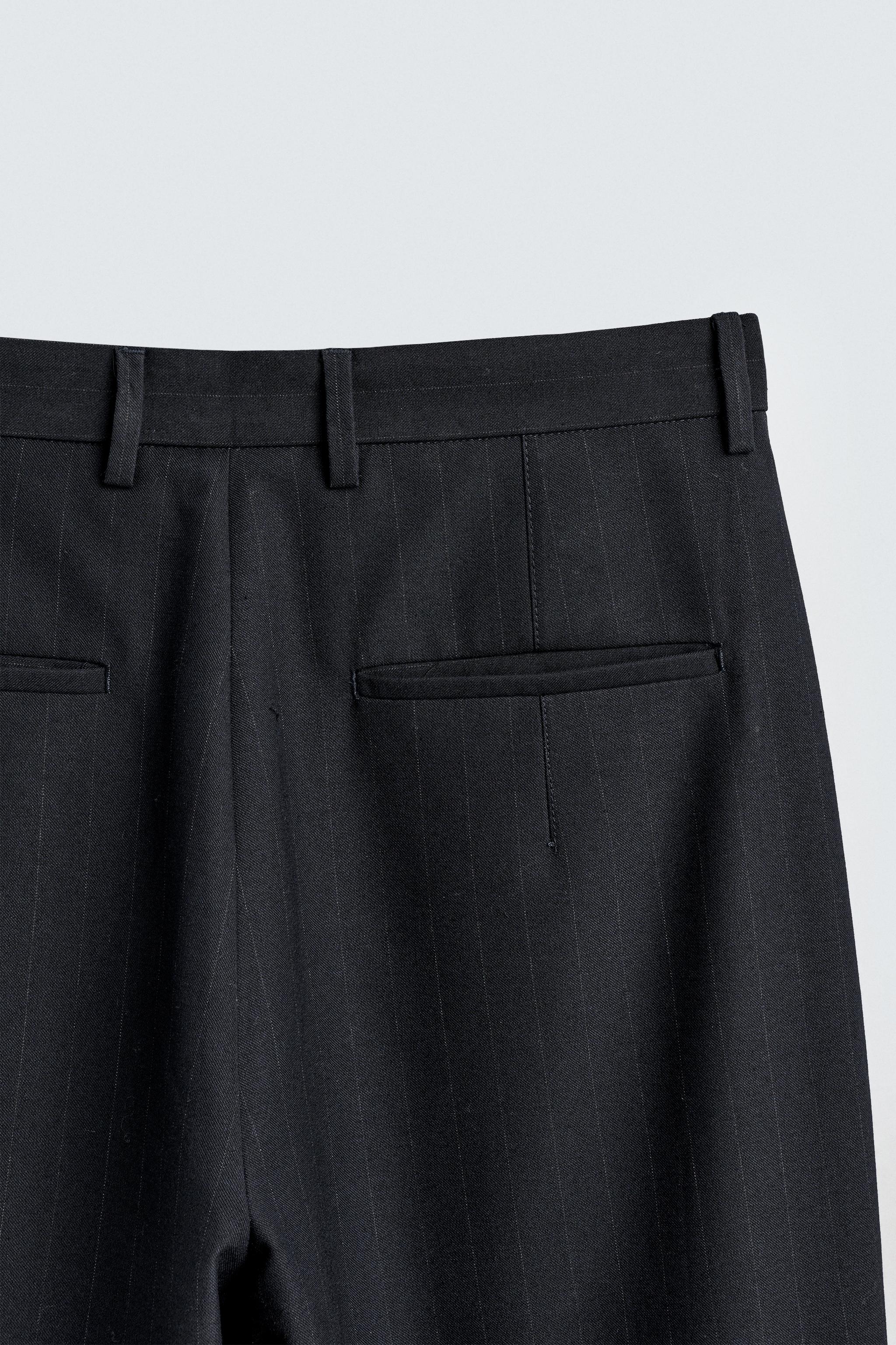 PLEATED PINSTRIPE PANTS